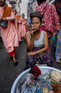 Cigar smoking woman in Yangon